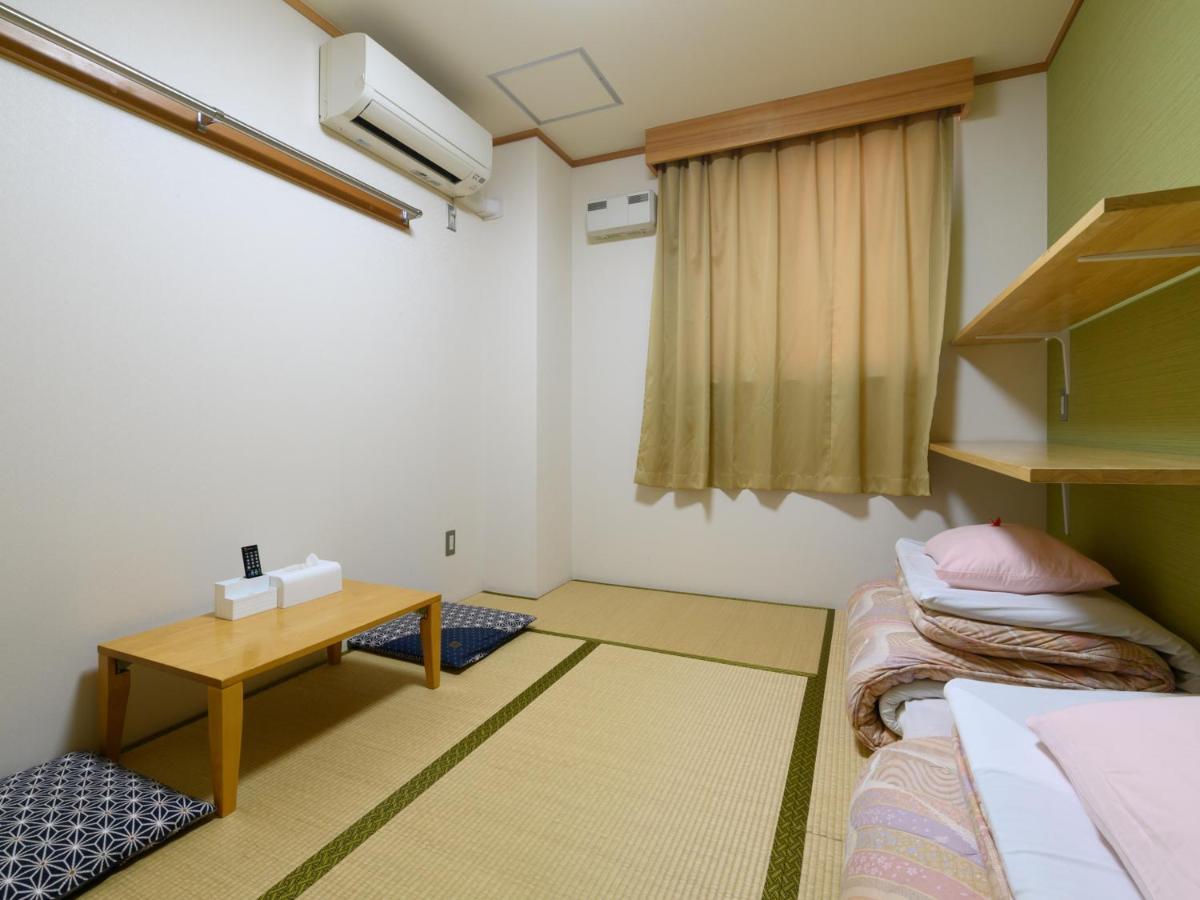 Отель Tabist Yuen No Yado Fujimi Фудзи Экстерьер фото